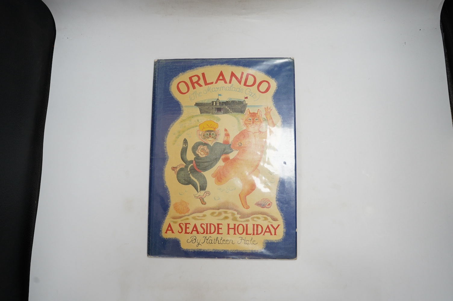 Hale, Kathleen - Orlando (The Marmalade Cat): A Seaside Holiday, 1st edition, lithographed illustrations by the author, printed in colour throughout, folio, original cloth-backed pictorial boards, dust-jacket, with price